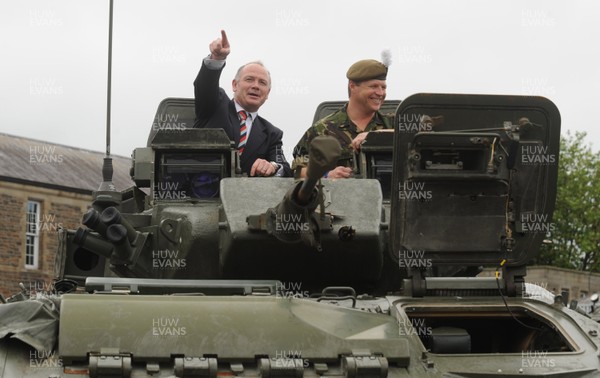 15.07.08 - Help for Heroes Rugby Challenge Match Press Conference - Ieuan Evans(International Select XV Manager) and Scott Gibbs(International Select XV Captain) sit in one of the Royal Welsh tankers during the Welsh launch of the Help for Heroes rugby challenge match at Maindy Barracks, Cardiff. 