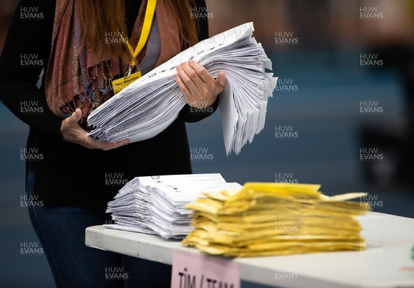 070521 - Picture shows the sorting process of the votes starting for the Senedd elections in the House of Sport, Cardiff this morning