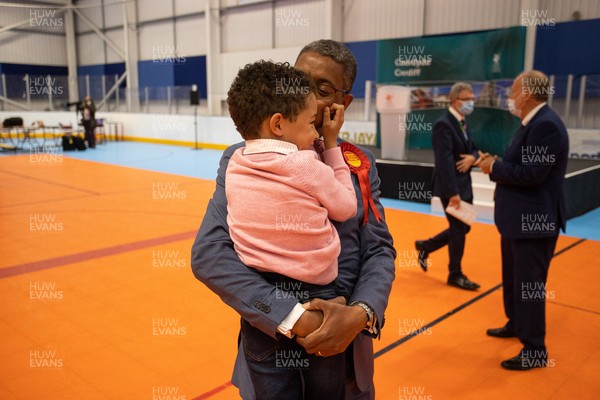 070521 - Picture shows Vaughan Gething with his son celebrating after winning Cardiff South and Penarth during the count for the Senedd elections in the House of Sport, Cardiff