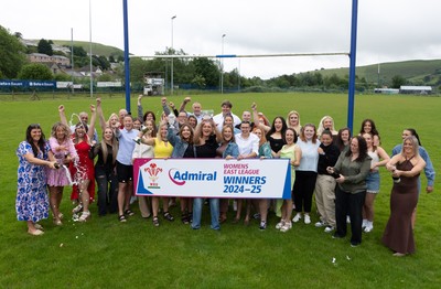 070625 - Senghenydd RFC Sirens - Senghenydd Sirens captain Shirey Webley with the trophy as the team celebrate winning the Admiral Women’s East League Title