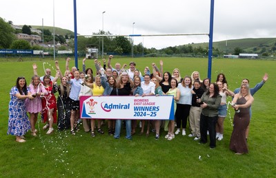 070625 - Senghenydd RFC Sirens - Senghenydd Sirens captain Shirey Webley with the trophy as the team celebrate winning the Admiral Women’s East League Title