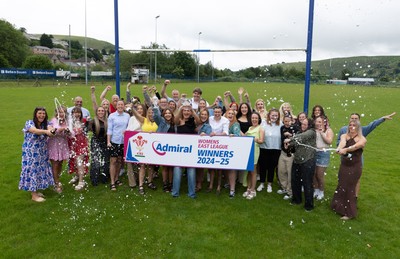 070625 - Senghenydd RFC Sirens - Senghenydd Sirens captain Shirey Webley with the trophy as the team celebrate winning the Admiral Women’s East League Title