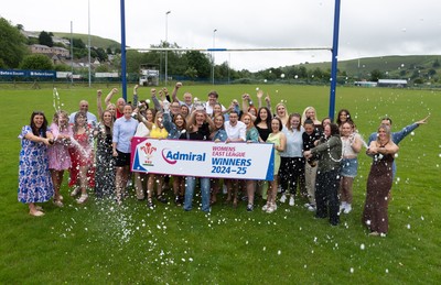 070625 - Senghenydd RFC Sirens - Senghenydd Sirens captain Shirey Webley with the trophy as the team celebrate winning the Admiral Women’s East League Title