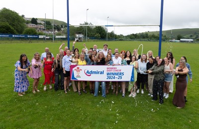 070625 - Senghenydd RFC Sirens - Senghenydd Sirens captain Shirey Webley with the trophy as the team celebrate winning the Admiral Women’s East League Title