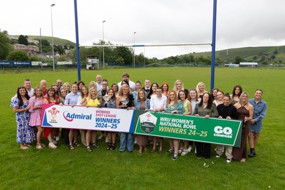 070625 - Senghenydd RFC Sirens - Senghenydd Sirens captain Shirey Webley with the trophy as the team celebrate winning the Admiral Women’s East League Title and the WRU Women’s National Bowl
