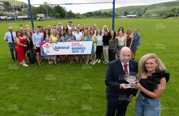 070625 - Senghenydd RFC Sirens - Senghenydd Sirens captain Shirey Webley receives the trophy from WRU representative Roy Wilkinson as the team celebrate winning the Admiral Women’s East League Title