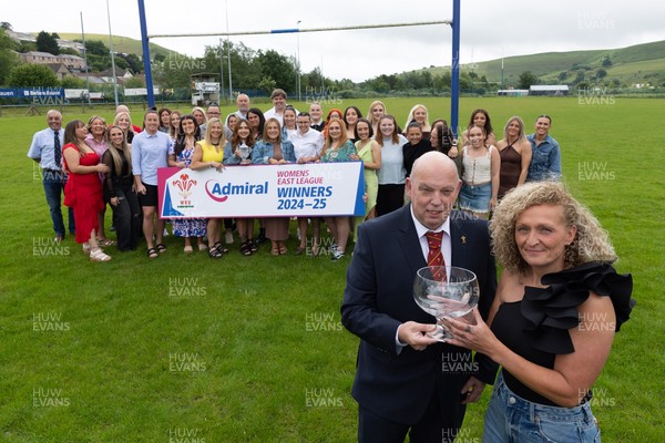 070625 - Senghenydd RFC Sirens - Senghenydd Sirens captain Shirey Webley receives the trophy from WRU representative Roy Wilkinson as the team celebrate winning the Admiral Women’s East League Title