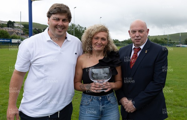 070625 - Senghenydd RFC Sirens - Senghenydd Sirens captain Shirey Webley with the trophy along with head coach Joe Harwood and WRU representative Roy Wilkinson as the team celebrate winning the Admiral Women’s East League Title
