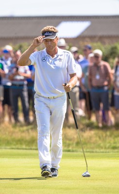 250714 -  The Senior Open Championship, Royal Porthcawl Golf Club, Wales - Bernhard Langer acknowledges the crowds as he finishes the day on 11 under par