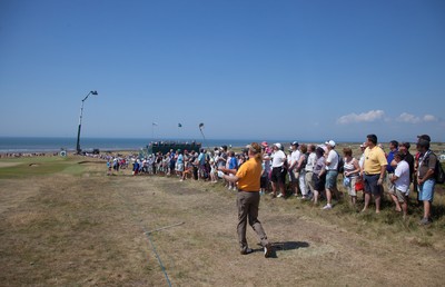 250714 -  The Senior Open Championship, Royal Porthcawl Golf Club, Wales - Miguel Angel Jimenez plays out of the rough onto the 14th green