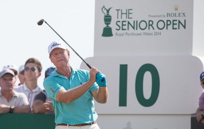 250714 -  The Senior Open Championship, Royal Porthcawl Golf Club, Wales - Tom Watson of the USA tees off on the 10th