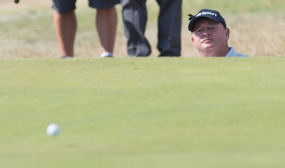 250714 -  The Senior Open Championship, Royal Porthcawl Golf Club, Wales - Ian Woosnam of Wales looks on after playing out of the bunker on the 9th