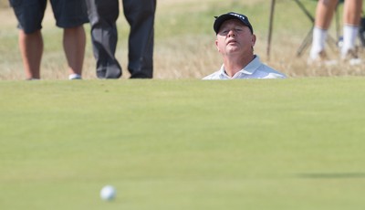 250714 -  The Senior Open Championship, Royal Porthcawl Golf Club, Wales - Ian Woosnam of Wales looks on after playing out of the bunker on the 9th