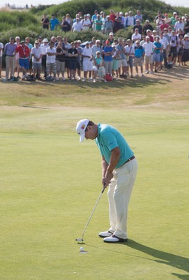 250714 -  The Senior Open Championship, Royal Porthcawl Golf Club, Wales - Tom Watson of the USA putts on the 13th