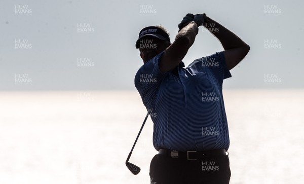 260714 -  The Senior Open Championship, Royal Porthcawl Golf Club, Wales - Colin Montgomerie plays his approach shot to the 18th