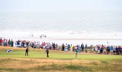 270714 -  The Senior Open Championship, Royal Porthcawl Golf Club, Wales - Bernhard Langer attempts a long range putt on the first green during the final round of the Senior Open at Royal Porthcawl Golf Club