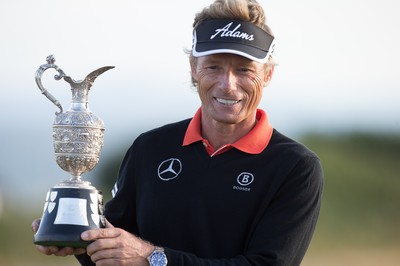 270714 -  The Senior Open Championship, Royal Porthcawl Golf Club, Wales - Germany's Bernhard Langer celebrates with the trophy after winning the Senior Open at Royal Porthcawl Golf Club by 13 shots