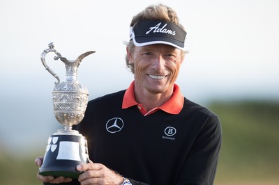 270714 -  The Senior Open Championship, Royal Porthcawl Golf Club, Wales - Germany's Bernhard Langer celebrates with the trophy after winning the Senior Open at Royal Porthcawl Golf Club by 13 shots