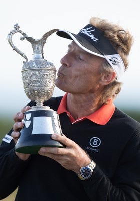 270714 -  The Senior Open Championship, Royal Porthcawl Golf Club, Wales - Germany's Bernhard Langer celebrates with the trophy after winning the Senior Open at Royal Porthcawl Golf Club by 13 shots