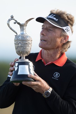 270714 -  The Senior Open Championship, Royal Porthcawl Golf Club, Wales - Germany's Bernhard Langer celebrates with the trophy after winning the Senior Open at Royal Porthcawl Golf Club by 13 shots