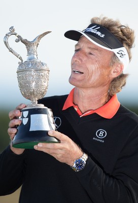 270714 -  The Senior Open Championship, Royal Porthcawl Golf Club, Wales - Germany's Bernhard Langer celebrates with the trophy after winning the Senior Open at Royal Porthcawl Golf Club by 13 shots