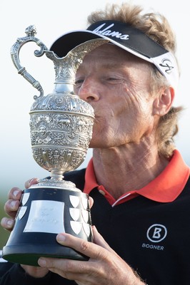 270714 -  The Senior Open Championship, Royal Porthcawl Golf Club, Wales - Germany's Bernhard Langer celebrates with the trophy after winning the Senior Open at Royal Porthcawl Golf Club by 13 shots