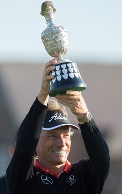 270714 -  The Senior Open Championship, Royal Porthcawl Golf Club, Wales - Germany's Bernhard Langer celebrates with the trophy after winning the Senior Open at Royal Porthcawl Golf Club by 13 shots