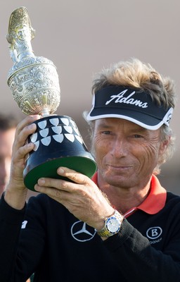 270714 -  The Senior Open Championship, Royal Porthcawl Golf Club, Wales - Germany's Bernhard Langer celebrates with the trophy after winning the Senior Open at Royal Porthcawl Golf Club by 13 shots