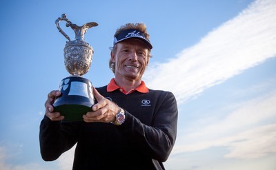 270714 -  The Senior Open Championship, Royal Porthcawl Golf Club, Wales - Germany's Bernhard Langer celebrates with the trophy after winning the Senior Open at Royal Porthcawl Golf Club by 13 shots