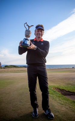 270714 -  The Senior Open Championship, Royal Porthcawl Golf Club, Wales - Germany's Bernhard Langer celebrates with the trophy after winning the Senior Open at Royal Porthcawl Golf Club by 13 shots