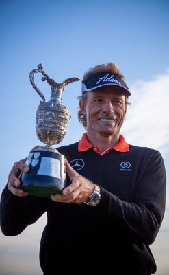 270714 -  The Senior Open Championship, Royal Porthcawl Golf Club, Wales - Germany's Bernhard Langer celebrates with the trophy after winning the Senior Open at Royal Porthcawl Golf Club by 13 shots