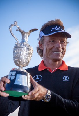 270714 -  The Senior Open Championship, Royal Porthcawl Golf Club, Wales - Germany's Bernhard Langer celebrates with the trophy after winning the Senior Open at Royal Porthcawl Golf Club by 13 shots