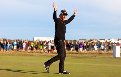 270714 -  The Senior Open Championship, Royal Porthcawl Golf Club, Wales - Germany's Bernhard Langer celebrates after winning the Senior Open at Royal Porthcawl Golf Club by 13 shots