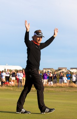 270714 -  The Senior Open Championship, Royal Porthcawl Golf Club, Wales - Germany's Bernhard Langer celebrates after winning the Senior Open at Royal Porthcawl Golf Club by 13 shots