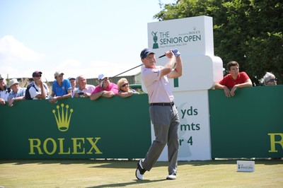 220714 -  The Senior Open Pro Am Competition, Royal Porthcawl Golf Club, Wales - Tom Watson of the USA tees off at the start of the Pro Am Tournament  