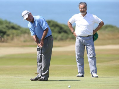 220714 -  The Senior Open Pro Am Competition, Royal Porthcawl Golf Club, Wales - Cory Pavin of the USA plays putts during the Pro Am Tournament played ahead of the start of the Senior Open 2014 