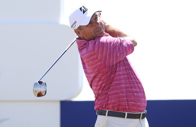 220714 -  The Senior Open Pro Am Competition, Royal Porthcawl Golf Club, Wales - Fred Couples of the USA tees off at the third during the Pro Am Tournament played ahead of the start of the Senior Open 2014 