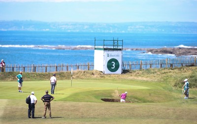 220714 -  The Senior Open Pro Am Competition, Royal Porthcawl Golf Club, Wales - Fred Couples of the USA plays out of a bunker during the Pro Am Tournament played ahead of the start of the Senior Open 2014 