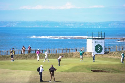 220714 -  The Senior Open Pro Am Competition, Royal Porthcawl Golf Club, Wales - Competitors play the third hole of the Royal Porthcawl course during the Pro Am Tournament played ahead of the start of the Senior Open 2014 