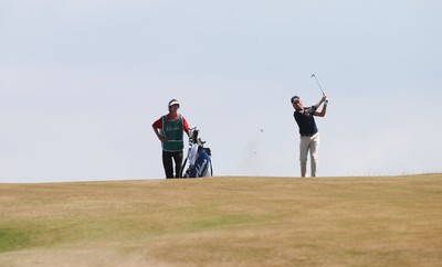 220714 -  The Senior Open Pro Am Competition, Royal Porthcawl Golf Club, Wales - Bernhard Langer of Germany plays down the 14th  of the Royal Porthcawl course during the Pro Am Tournament played ahead of the start of the Senior Open 2014