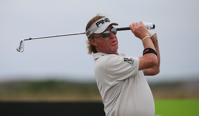 220714 -  The Senior Open Pro Am Competition, Royal Porthcawl Golf Club, Wales - Miguel Angel Jimenez tees off during the Pro Am Tournament played ahead of the start of the Senior Open 2014 