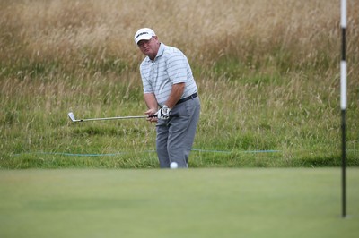 220714 -  The Senior Open Pro Am Competition, Royal Porthcawl Golf Club, Wales - Ian Woosnam putts during the Pro Am Tournament played ahead of the start of the Senior Open 2014 