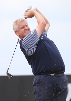 220714 -  The Senior Open Pro Am Competition, Royal Porthcawl Golf Club, Wales - Colin Montgomerie tees off during the Pro Am Tournament played ahead of the start of the Senior Open 2014 