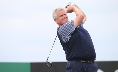 220714 -  The Senior Open Pro Am Competition, Royal Porthcawl Golf Club, Wales - Colin Montgomerie tees off during the Pro Am Tournament played ahead of the start of the Senior Open 2014 