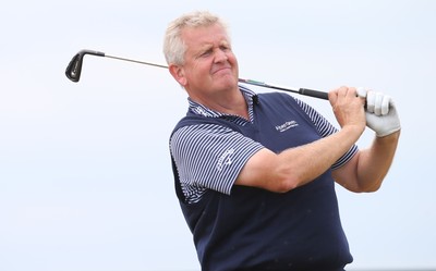 220714 -  The Senior Open Pro Am Competition, Royal Porthcawl Golf Club, Wales - Colin Montgomerie tees off during the Pro Am Tournament played ahead of the start of the Senior Open 2014 