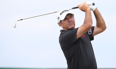 220714 -  The Senior Open Pro Am Competition, Royal Porthcawl Golf Club, Wales - David Frost from South Africa tees off during the Pro Am Tournament played ahead of the start of the Senior Open 2014 