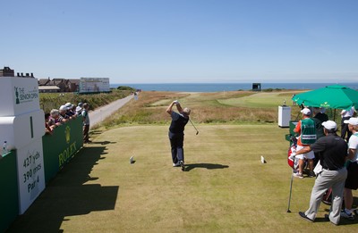 220714 -  The Senior Open Pro Am Competition, Royal Porthcawl Golf Club, Wales - Colin Montgomerie tees off at the first during the Pro Am Tournament played ahead of the start of the Senior Open 2014 