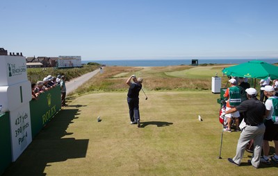 220714 -  The Senior Open Pro Am Competition, Royal Porthcawl Golf Club, Wales - Colin Montgomerie tees off at the first during the Pro Am Tournament played ahead of the start of the Senior Open 2014 