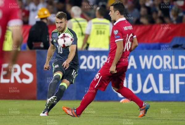 110617 Serbia v Wales Aaron Ramsey crosses the ball