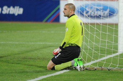 110912 - Serbia v Wales - 2014 World Cup Qualifier -Glyn MYHILL of Wales looks dejected after a Serbia goal